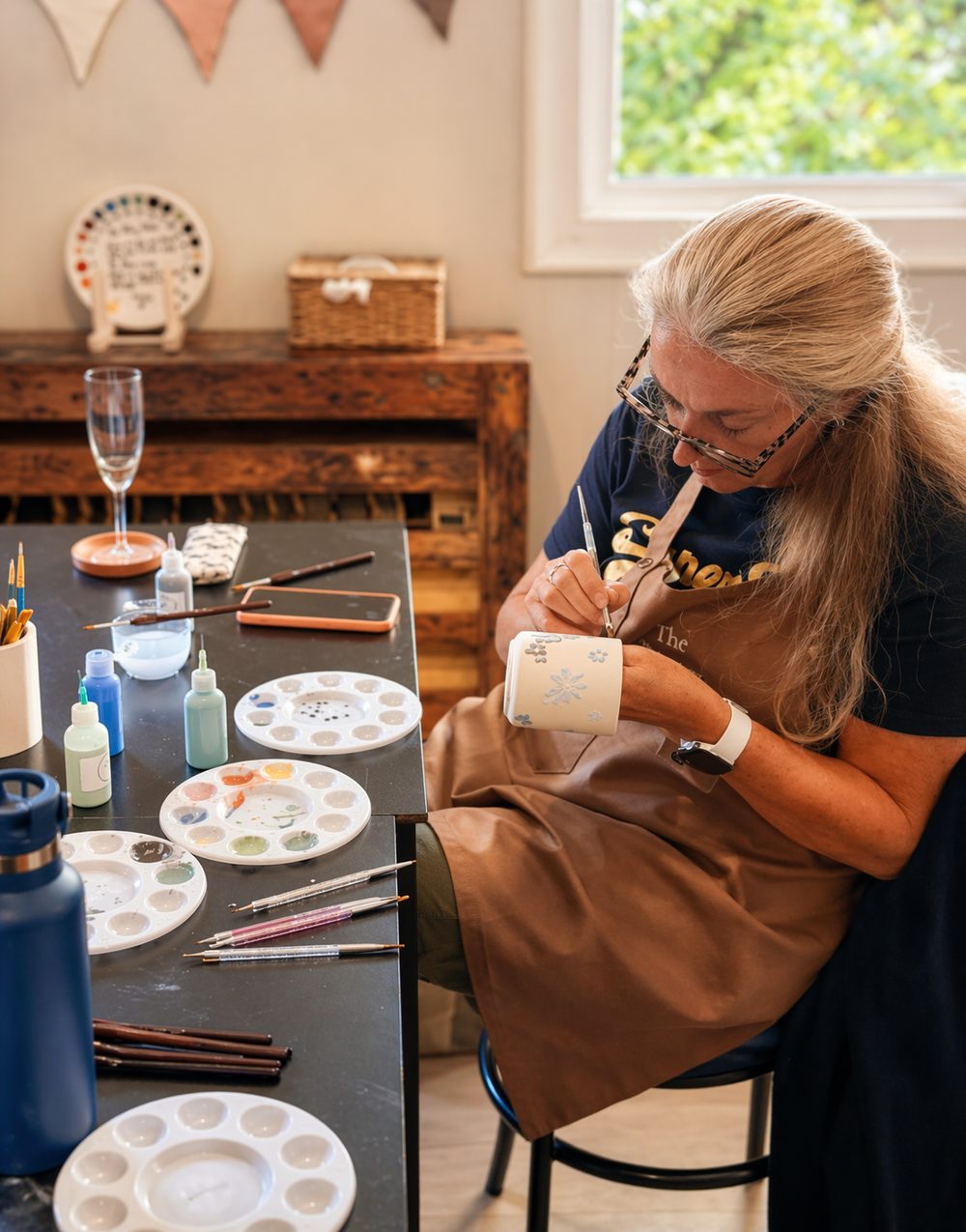 Painting a mug with delicate flowers